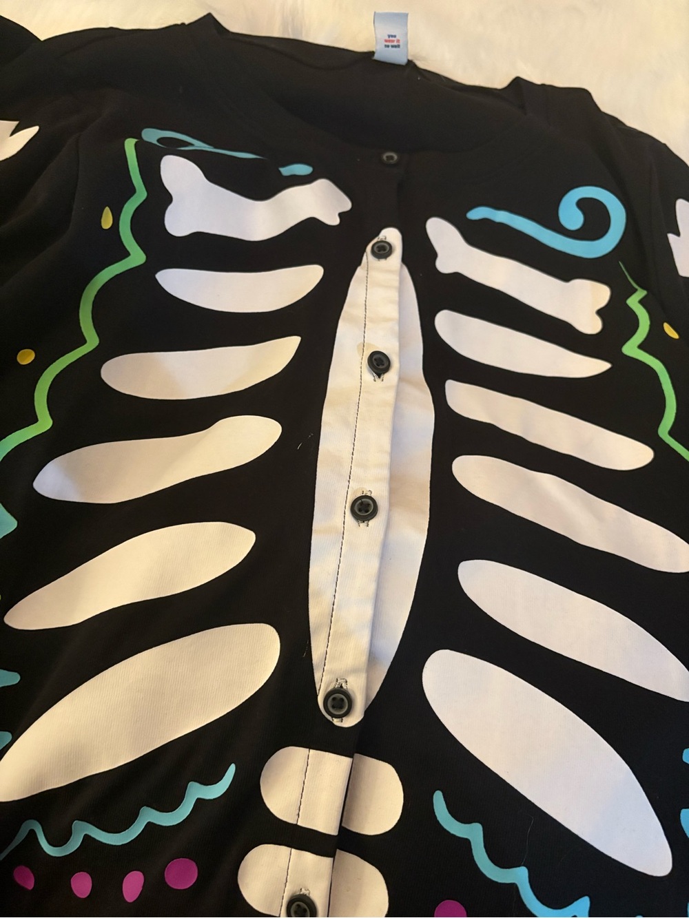 Old Navy Black Skeleton OneSie pajamas with White Bones and Colorful Accents